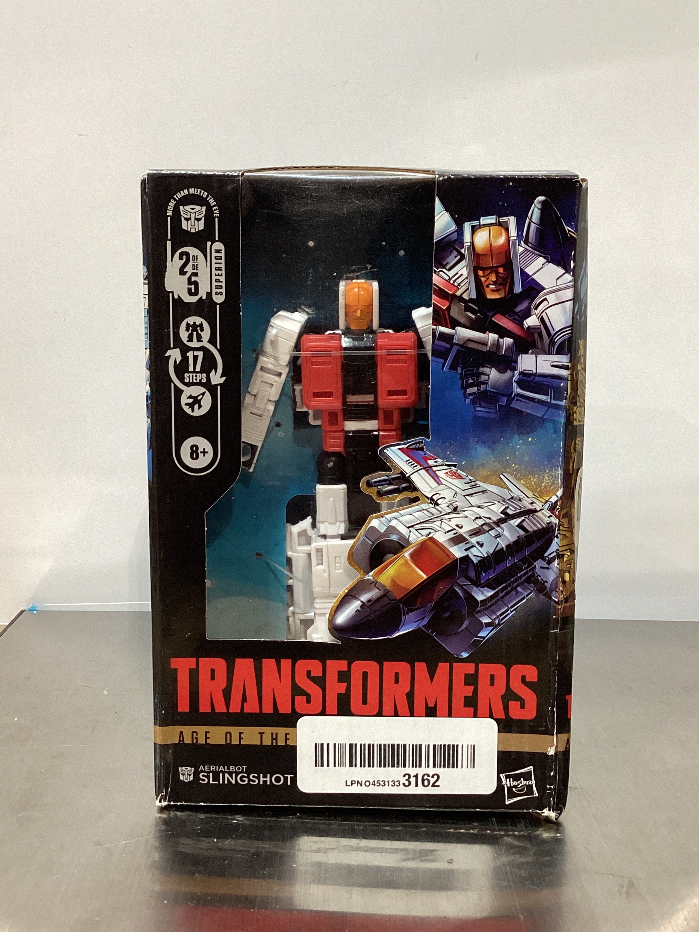 Transformers Age of the Primes | Aerialbot Slingshot Deluxe 14 cm | Robot y Jet en 17 Pasos | +8 Años