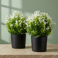 Set de 2 macetas negras con flores blancas decorativas