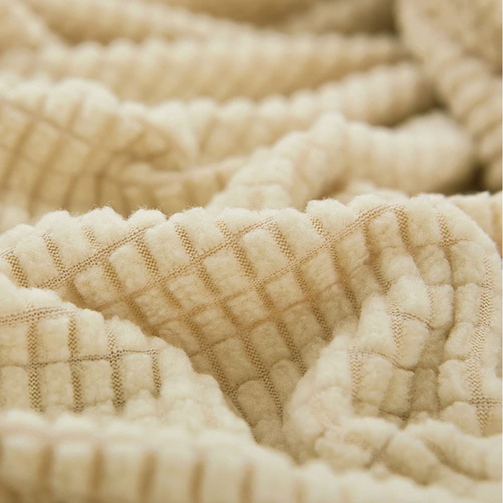 Funda elastica de terciopelo para sofa beige.