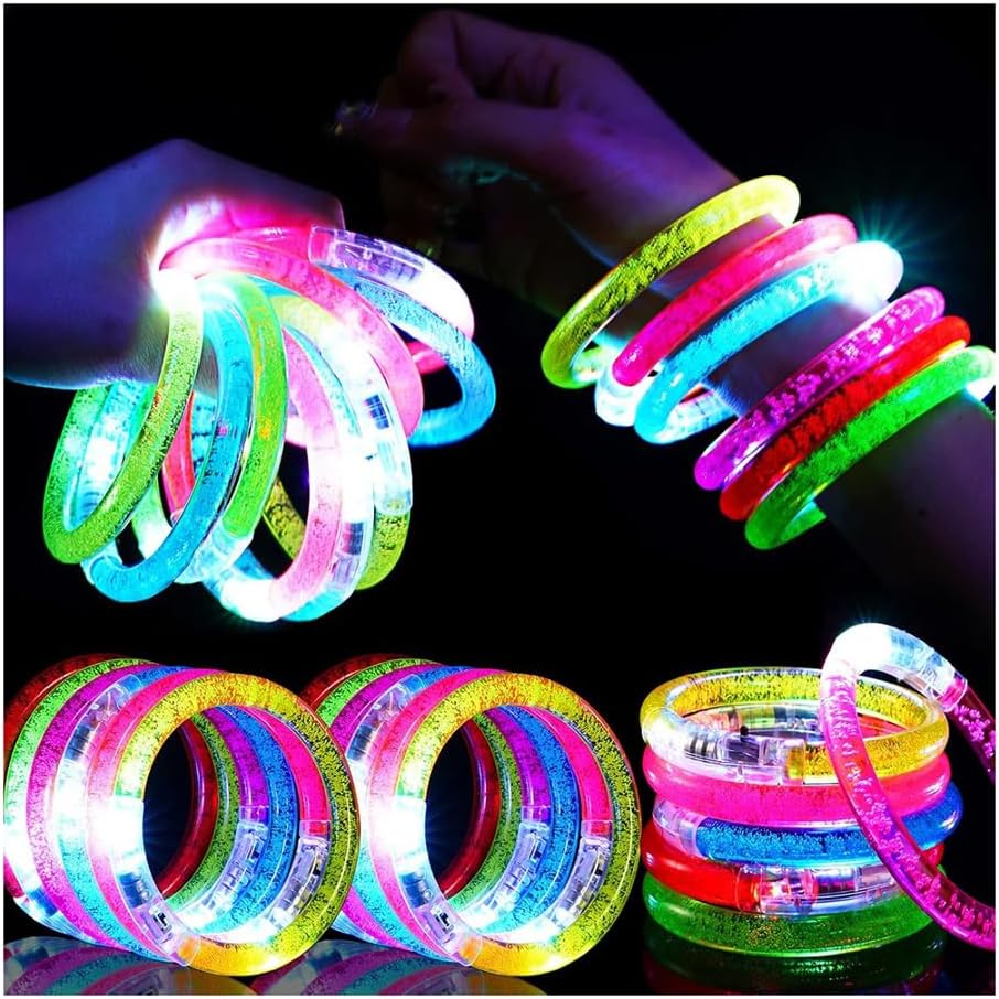 Mikulala 24 piezas de artículos para fiestas que brillan en la oscuridad para niños/adultos, juguetes luminosos intermitentes, pulseras LED, barras luminosas para el 4 de julio, regalos para fiestas, carnavales, cumpleaños y conciertos.