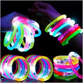 Mikulala 24 piezas de artículos para fiestas que brillan en la oscuridad para niños/adultos, juguetes luminosos intermitentes, pulseras LED, barras luminosas para el 4 de julio, regalos para fiestas, carnavales, cumpleaños y conciertos.