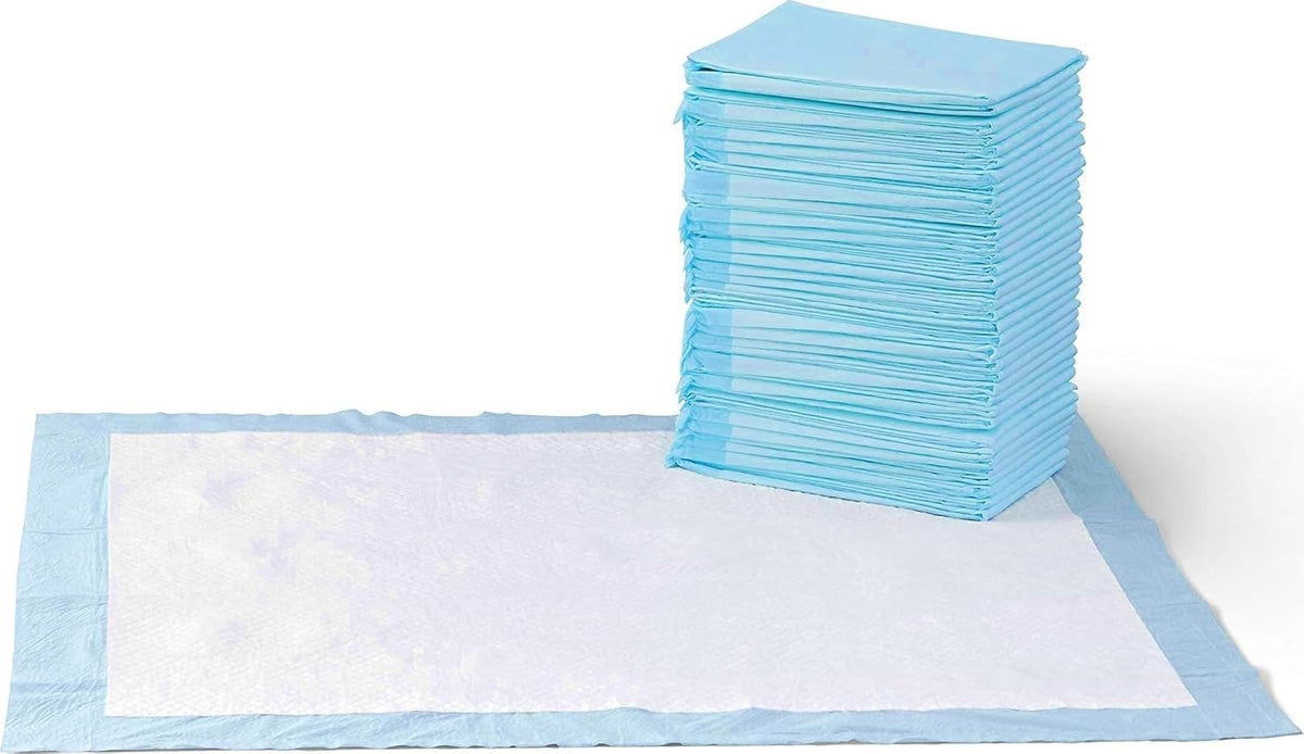 Pads de Entrenamiento Amazon Basics para Perros y Cachorros XL 28x34" – Antifugas 5 Capas Secado Rápido, Azul y Blanco, 40 Unidades