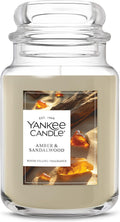 Vela aromática Yankee Candle de ámbar y sándalo, frasco grande de 624 g con hasta 150 horas de duración, ideal para regalar.
