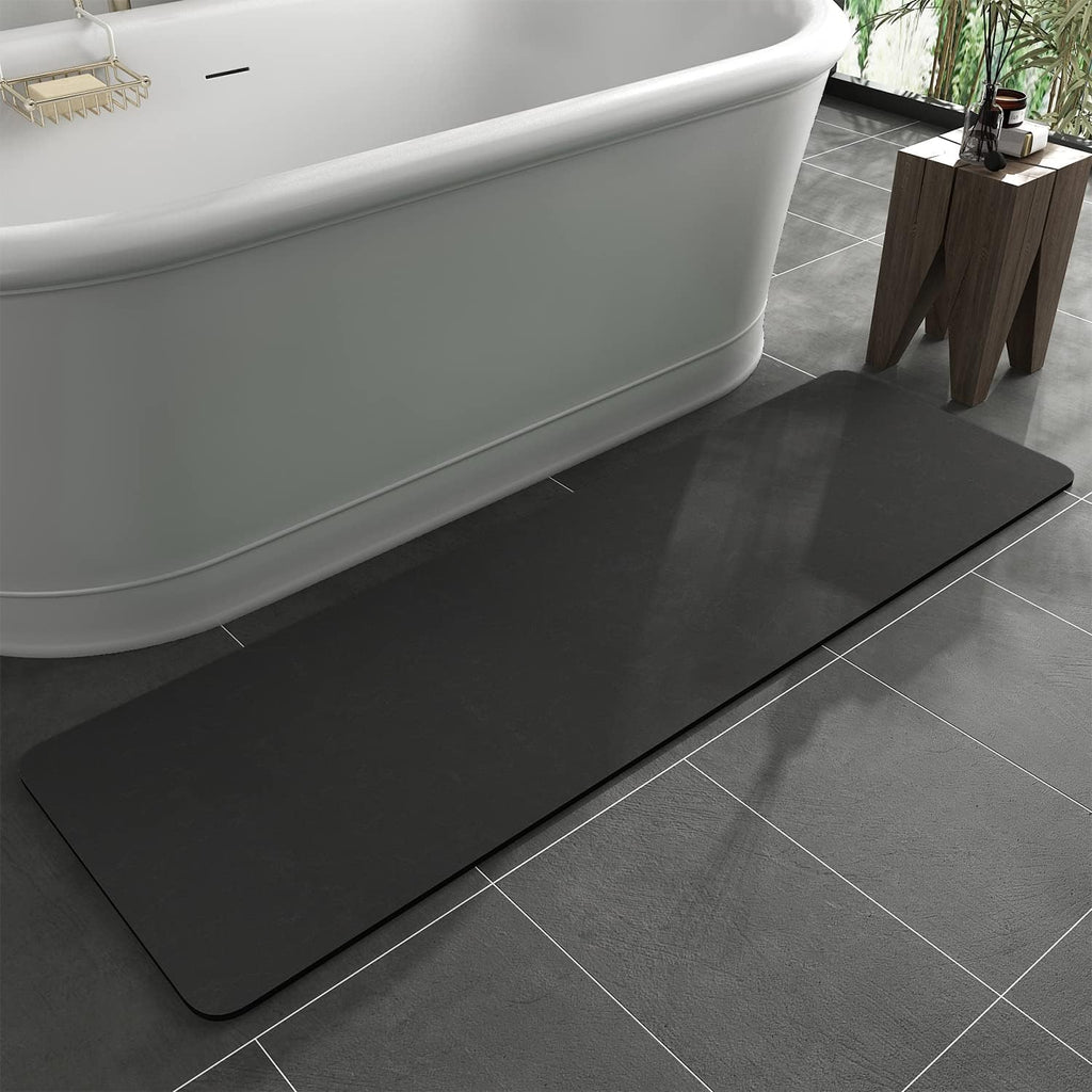 Alfombra de baño MontVoo con base de goma antideslizante, de secado rápido, absorbente y delgada. Se adapta debajo de la puerta. Superficie de gamuza sintética. Alfombra de ducha para colocar frente a la bañera o ducha. Gris oscuro, 43 x 150 cm.