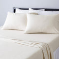 Amazon Basics Juego de sábanas de 4 piezas, 100% algodón jersey, incluye sábanas super suaves, encimera y bajera, fundas de almohada, tamaño King color avena, diseño sólido