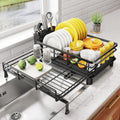 Escurridor de platos SNTD - Escurridor de platos extensible, escurridor grande para fregadero y encimera de cocina, colador de acero inoxidable con soporte para utensilios (negro)