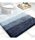 Alfombra de baño de textura suave con diseño degradado azul y blanco