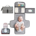 Cambiador portátil Kopi Baby - Bolsa de viaje para cambiar pañales con bolsillo para toallitas, cambiador portátil de diseño inteligente, kit de viaje para bebés, regalo para recién nacidos (niña y niño) - Flechas grises, Premium