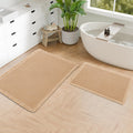 Alfombrillas de Baño Hiasan Pack 2 – Textura Gofre, Borlas Bohémias, Superabsorbentes y Antideslizantes, Base Goma, Marrón (40x61cm + 51x81cm)