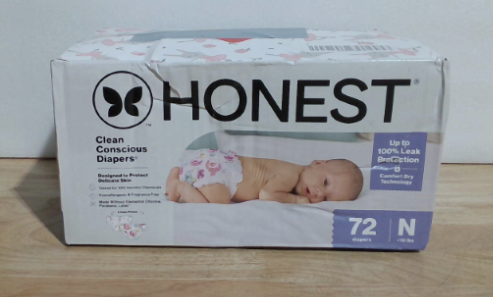 Pañales desechables diurnos Comfort Dry de The Honest Company para piel sensible, hipoalergénicos, estampado de rosas y tutú, caja Club Box, talla recién nacido, 72 unidades.