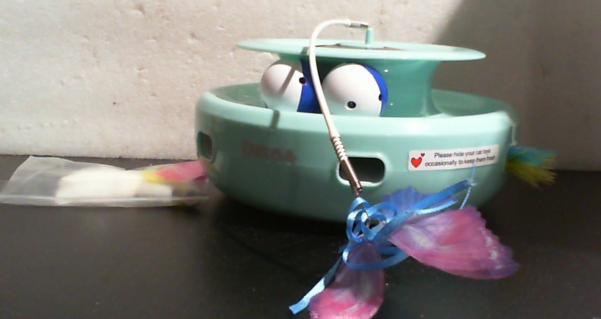 Juguete interactivo para gatos ORSDA verde agua con pelotas, plumas y mariposa