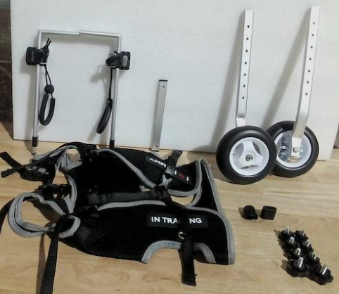 silla de ruedas para perros o mascotas con problemas de movilidad en sus patas traseras.( ARTICULO VIENE CON 8 PERILLAS MAS 8 PIEZAS ASI COMO SE OBSERVA EN LA SEGUNDA IMAGEN