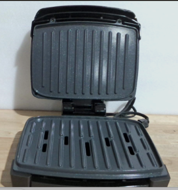 parrilla eléctrica de contacto totalmente sumergible de la marca George Foreman ( ARTICULO VIENE COMO SE OBSERVA EN LA SEGUNDA Y TERCERA IMAGEN )