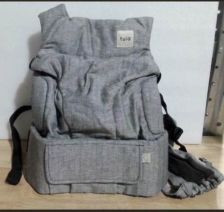 mochila portabebés ergonómica de la reconocida marca Baby Tula, específicamente del modelo Tula Explore en la colección Linen (lino). ( articulo viene como se muestra en la imagen 2)