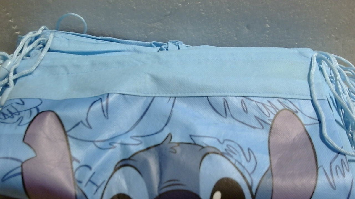 Set de bolsas de regalo para fiestas de Disney Stitch - Paquete con 12 bolsas con cordón de Stitch para niños, pegatinas y más artículos para fiestas de cumpleaños.