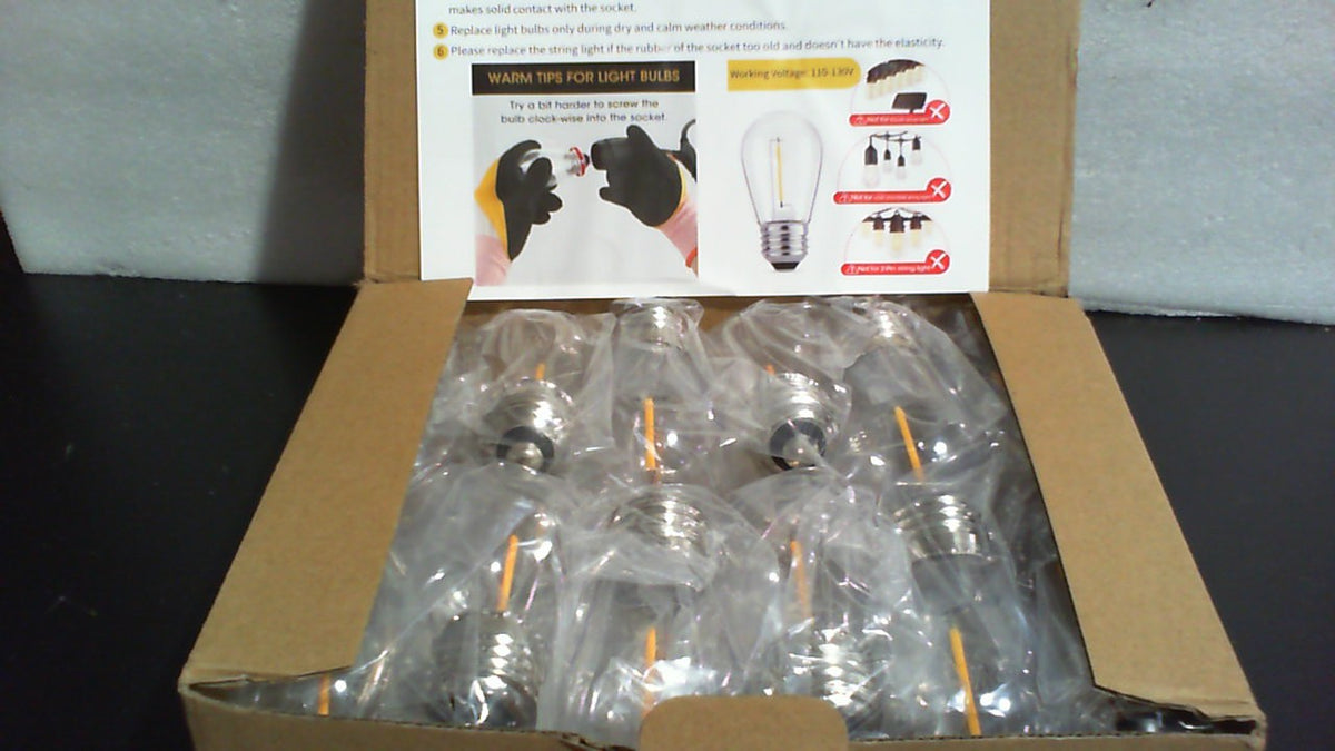 Paquete de 24 bombillas LED de repuesto Meconard S14, resistentes a roturas para exteriores, 1 vatio para reemplazar bombillas incandescentes de cadena de 11 vatios, base de rosca mediana E26, luz blanca cálida de 2200 K, no regulables.