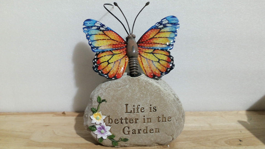 Estatua de mariposa solar LED XMHBCSM con alas brillantes que se iluminan - Figura decorativa para patio o jardín, para mujeres, mamás y abuelas (naranja)
