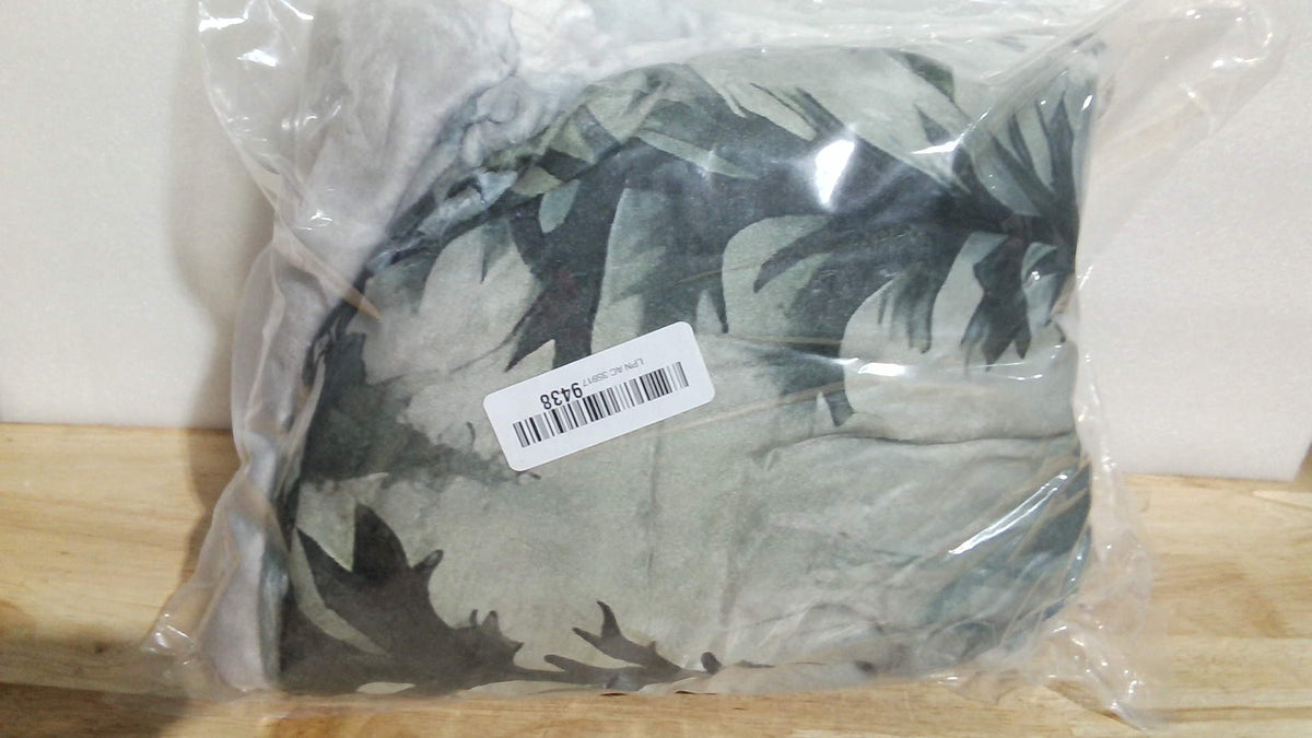 cojín decorativo estampado con hojas botánicas tropicales