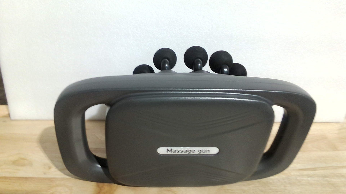 pistola de masaje muscular multifuncional de doble agarre (Multi-Head/Dual-Grip Massage Gun) no contiene el cable usb
