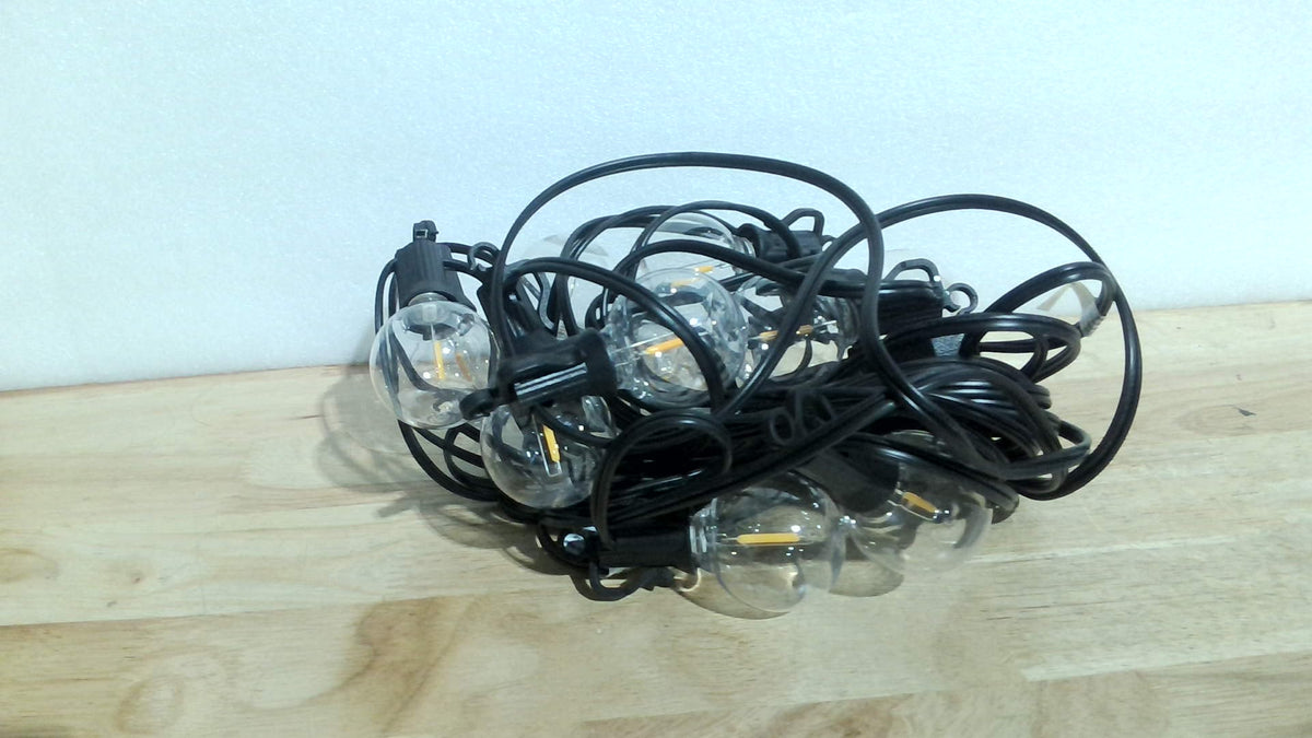luces decorativas para exteriores e interiores de la marca Brightown, específicamente el paquete de 29 pies (8.8 metros) con 12 bombillos