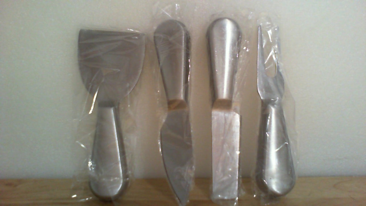 juego de 4 utensilios y cuchillos para queso.