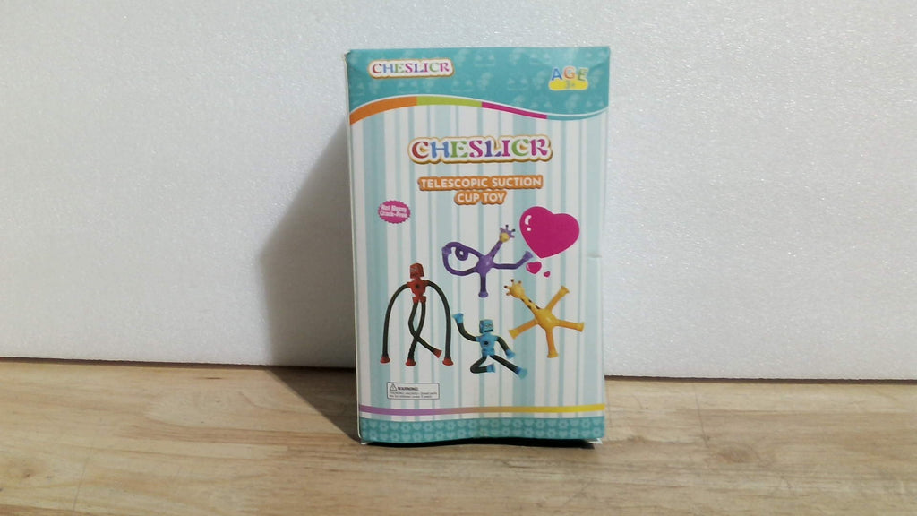 juguete sensorial elástico con tubos telescópicos y ventosas de la marca Cheslicr