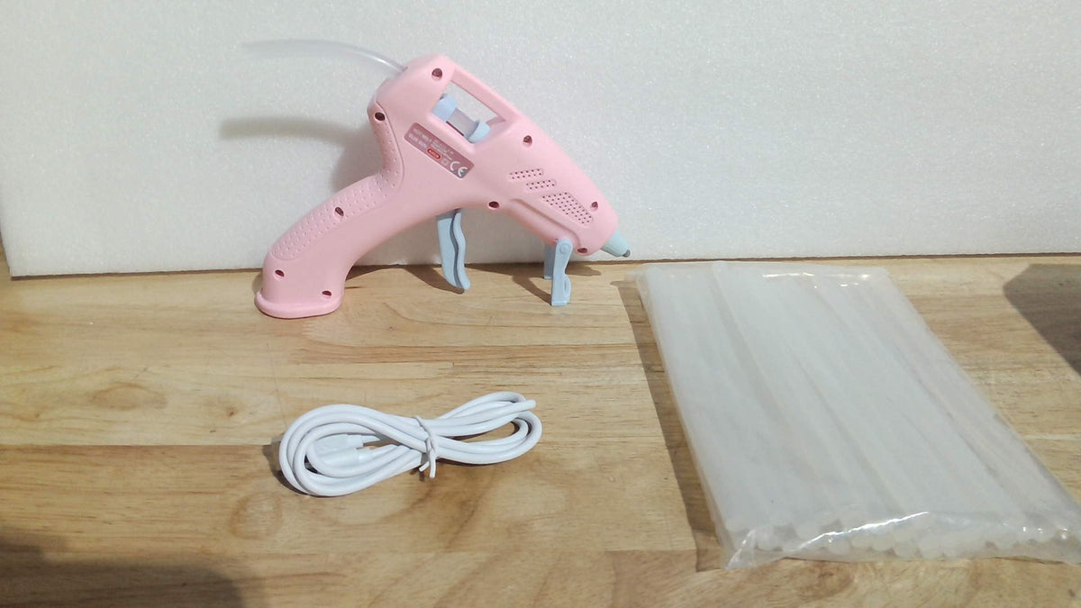 pistola de silicón caliente inalámbrica y recargable por USB, diseñada especialmente para manualidades, maquetas y pequeños trabajos de bricolaje.( ARTICULO VIENE COMO SE MUESTRA EN LA SEGUNDA IMAGEN  )