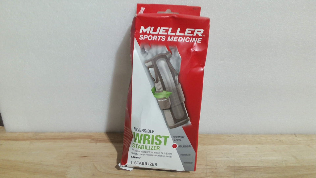 estabilizador de muñeca reversible Mueller Sports Medicine (Talla SM/MD) ARTICULO VIENE COMO SE OBSERVA EN LA SEGUNDA Y TERCERA IMAGEN