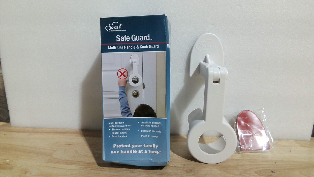 protector de seguridad infantil multiusos para manijas y perillas de la marca Jokari ARTICULO VIENE COMO SE MUESTRA EN LA SEGUNDA LA SEGUNDA IMAGEN