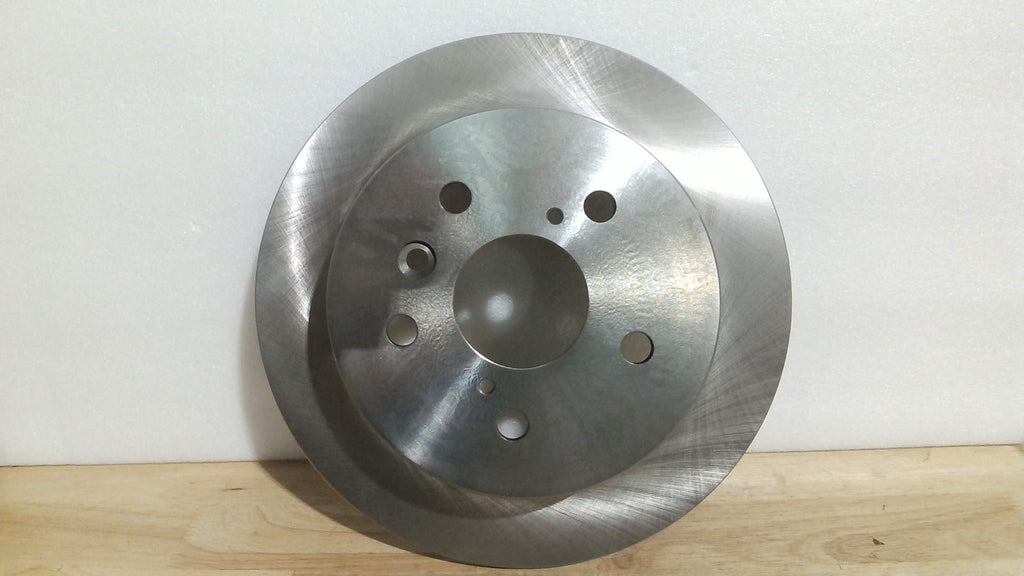 disco de freno para vehículo (o rotor de freno)  Es una pieza fundamental del sistema de frenado donde las pastillas ejercen presión para detener el automóvil. ( ARTICULO VIENE COMO SE MUESTRA EN LA SEGUNDA Y TERCERA IMAGEN SOLO UNA PIEZA