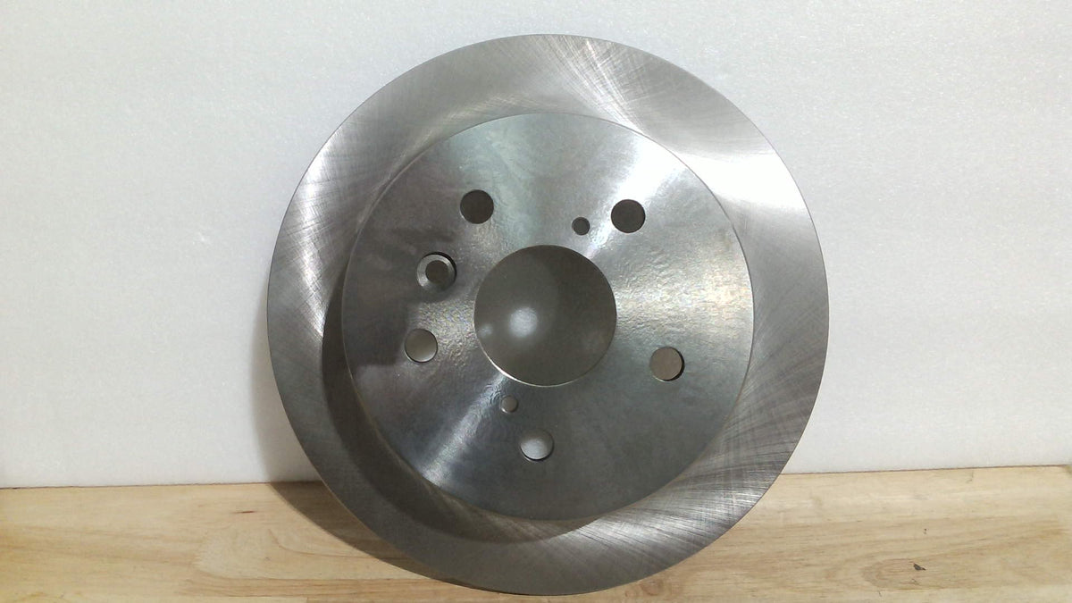 disco de freno para vehículo (o rotor de freno)  Es una pieza fundamental del sistema de frenado donde las pastillas ejercen presión para detener el automóvil. ( ARTICULO VIENE COMO SE MUESTRA EN LA SEGUNDA Y TERCERA IMAGEN SOLO UNA PIEZA