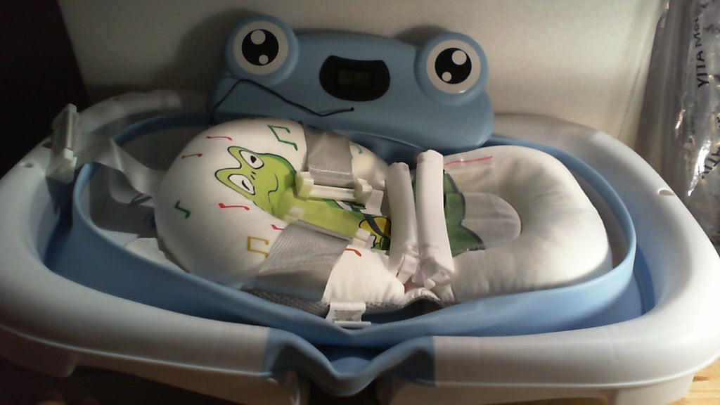 bañera plegable para bebé con diseño de ranita y cojin