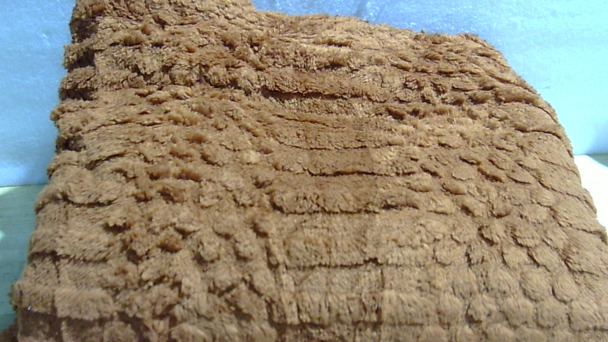 Manta Color Terracota con Textura en Relieve para un Ambiente Cálido y Acogedor