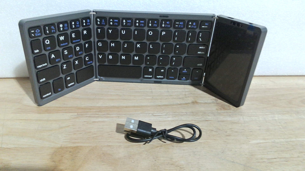 Teclado Inalámbrico Plegable con Touchpad (Modelo B089T).( ARTICULO VIENE COMO SE MUESTRA EN LA IMAGEN 2 Y 3