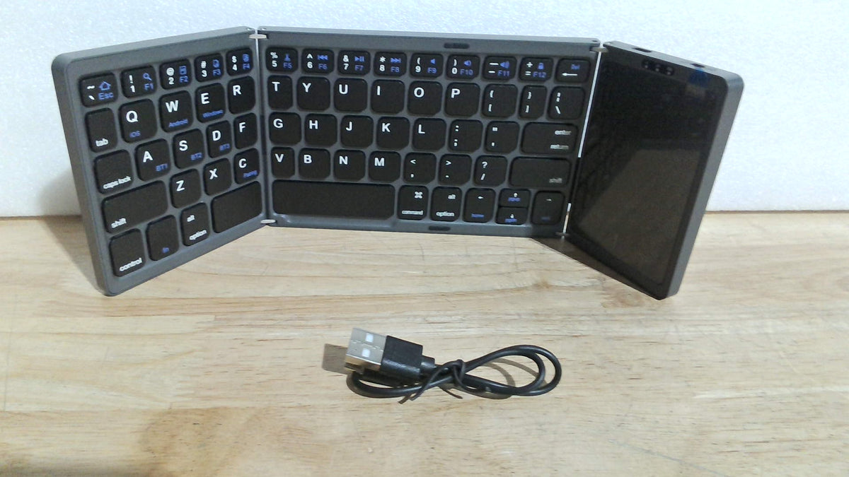 Teclado Inalámbrico Plegable con Touchpad (Modelo B089T).( ARTICULO VIENE COMO SE MUESTRA EN LA IMAGEN 2 Y 3