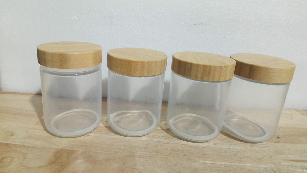frascos o tarros de vidrio herméticos con tapa de madera de bambú ( ARTICULO VIENE COMO SE MUESTRA EN LA IMAGEN 2