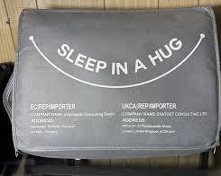 manta ponderada (weighted blanket) de la marca "Sleep in a Hug"