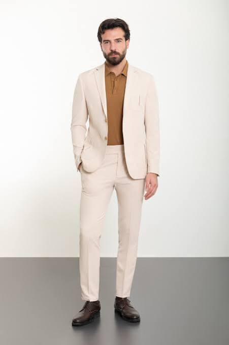 traje sastrero de dos piezas (saco o abrigo casual y pantalón)