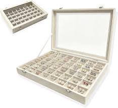 LEVES MANCHAS EN PARTE FRONTAL. caja organizadora y exhibidora de joyería con 48 compartimentos.