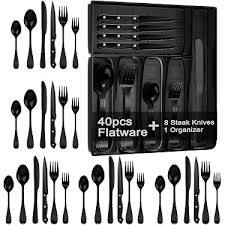 Set de 24 cubiertos variados en acero inoxidable negro.