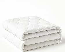 protector de cama impermeable de la marca Hygge Sheets (modelo Luxury Bamboo Bed Pad with Wings) ARTICULO VIENE COMO SE MUESTRA EN LA SEGUNDA IMAGEN