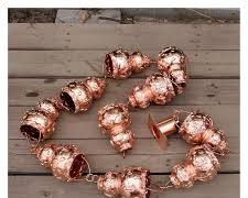 cadena de lluvia de cobre con diseño floral (estilo loto o rosa)
