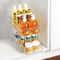 Organizador para debajo del fregadero ARSTPEOE - Paquete de 2 organizadores de almacenamiento extraíbles multiusos, estante organizador de armario deslizante y extraíble, almacenamiento para cocina y baño, transparente #1953
