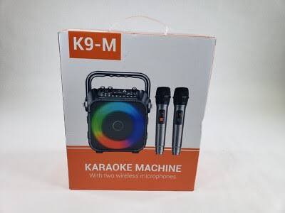 máquina de karaoke portátil con altavoz Bluetooth, usualmente identificada bajo modelos como el CYY K9-M o variantes similares de marcas multimedia. ( ARTICULO VIENE COMO SE MUESTRA EN LA SEGUNDA IMAGEN )