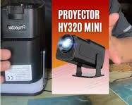 mini proyector inteligente portátil de la serie HY (comúnmente modelos HY300 Pro o HY320 Mini) SIN ACCESORIOS IMAGENES ILUSTRATIVAS SOLO CONTROL REMOTO