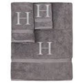 toalla de mano gris con la letra inicial "H"( articulo viene como se observa en la segunda imagen ) contiene 3 piezas