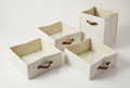 Set de organizadores de tela color marfil con asas marrones para mantener tus espacios ordenados
