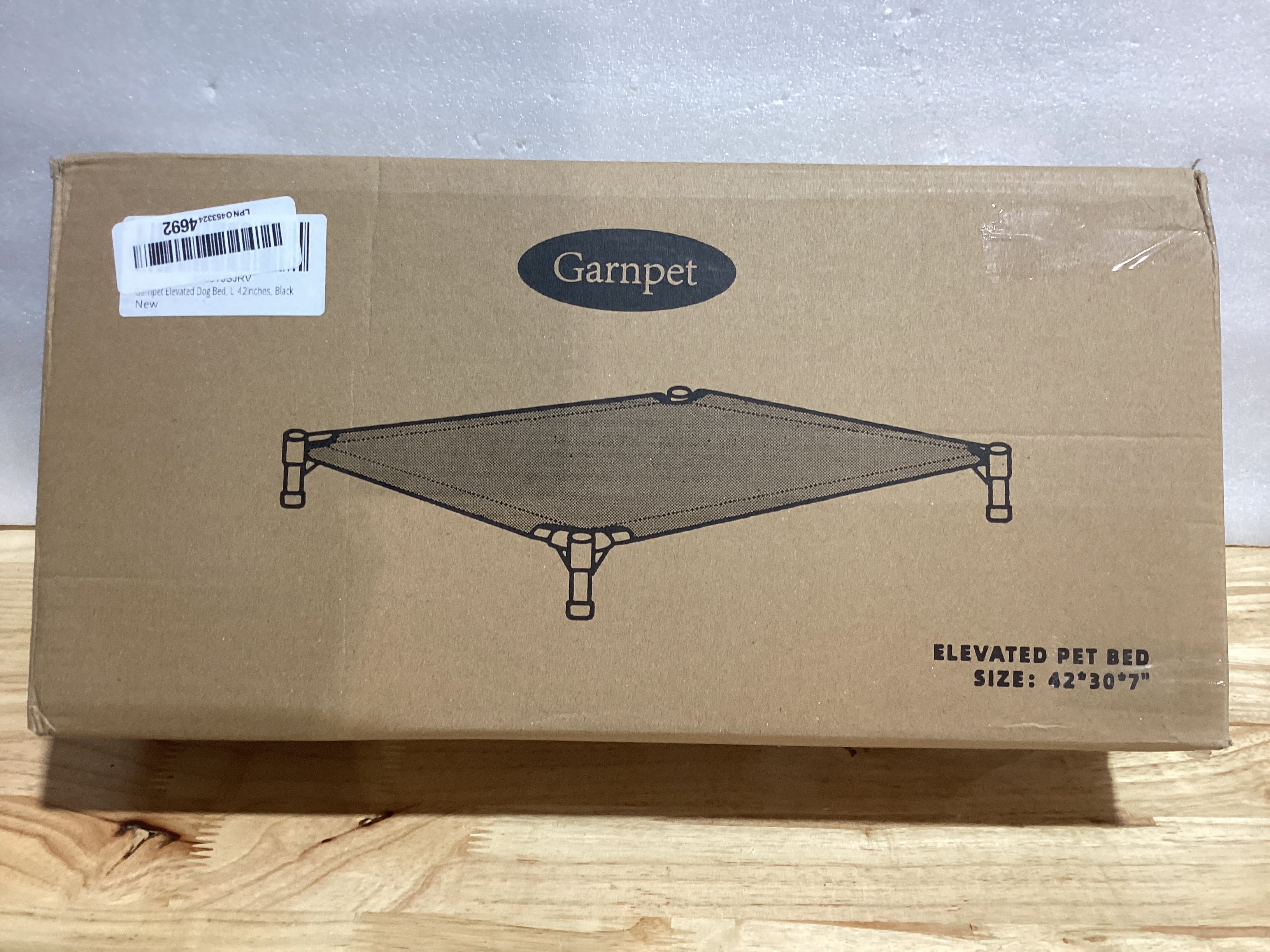 Cama Elevada para Perros Grandes Garnpet — Hasta 120 lbs, Malla Teslin Lavable, Uso Interior y Exterior, Negro