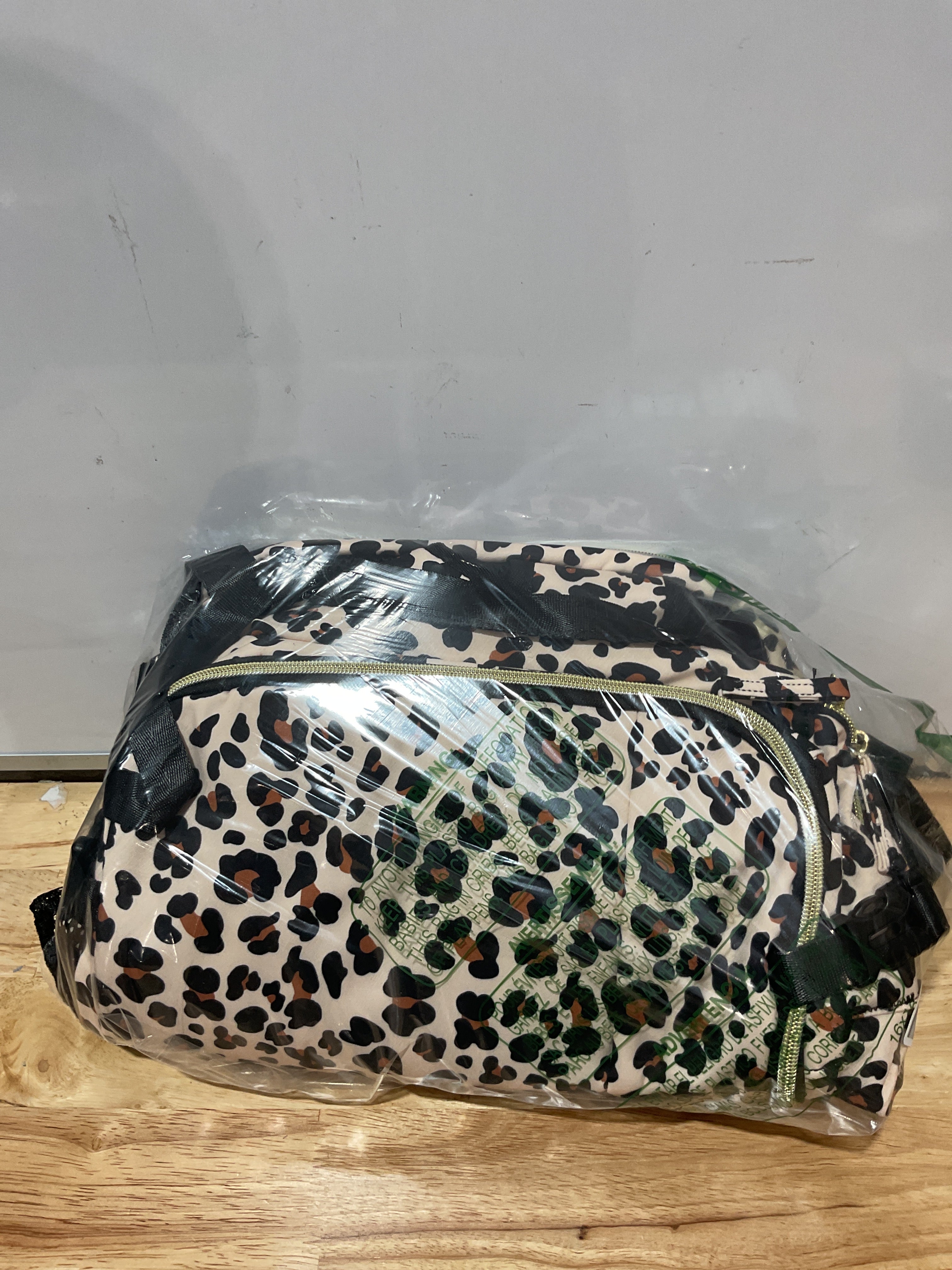 Mochila de Viaje Capolo Impermeable con Compartimento para Laptop 15.6" | Estampado Leopardo