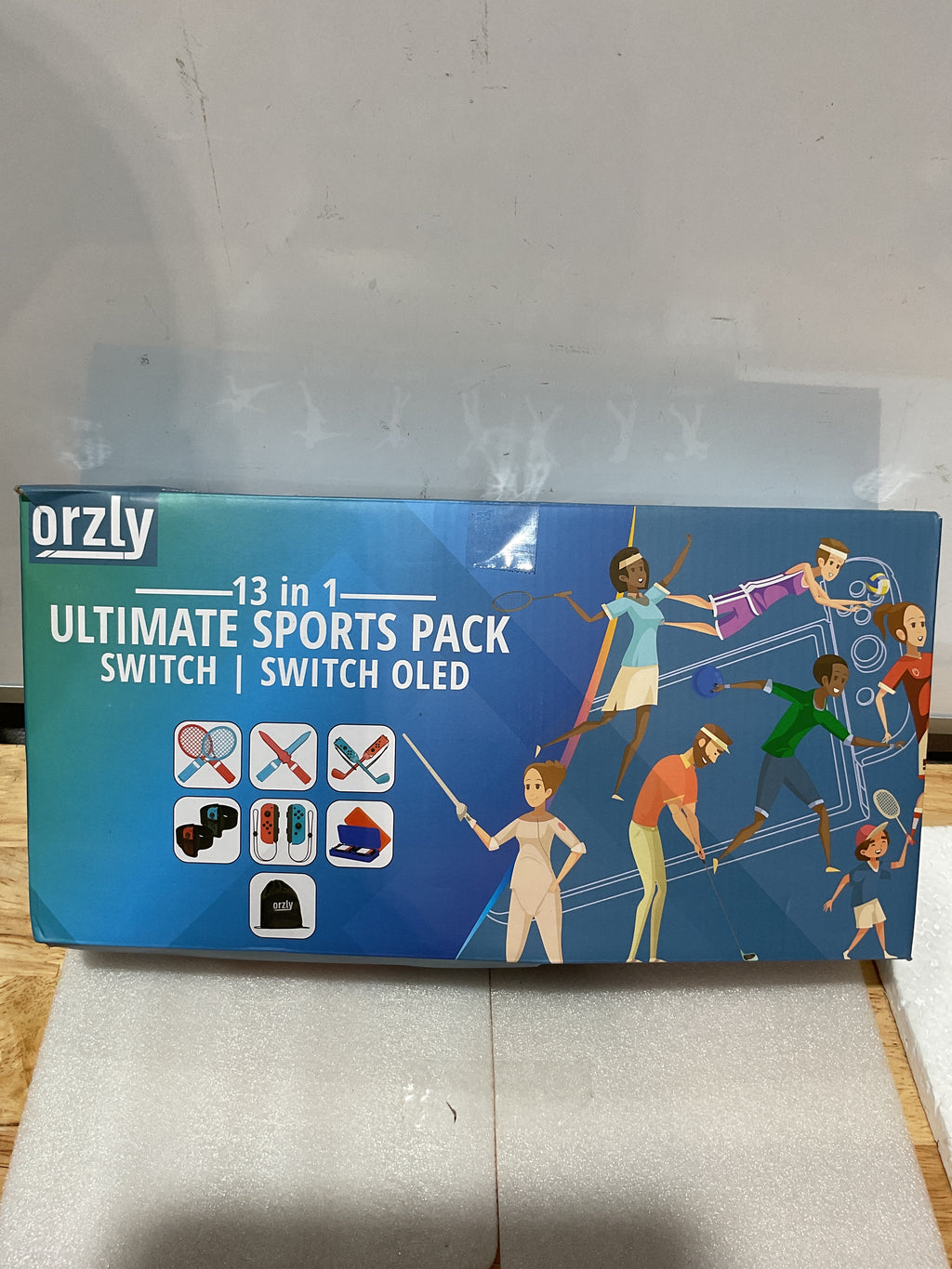 Pack de Accesorios Orzly para Nintendo Switch Sports 2024 – Raquetas, Palos de Golf, Espadas, Correas y Grips con Bolso